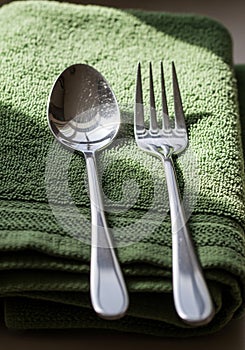 Elegant abstract infinity loop structure with a smooth metallic texture. The loop