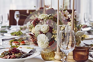 Elegant aesthetic wedding table setting, flowers arrangement