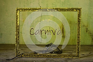 An elegant ancient mask framed for carnival photo