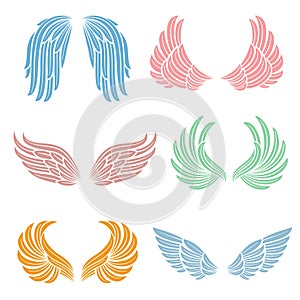 Elegant angel wings with long feather. Angelic symbols isolated vector set