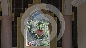 An elegant arched window opening in the Kek Lok Si Temple.