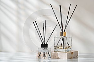 Elegant Aroma Diffusers on Marble Base in a Serene Indoor Setting