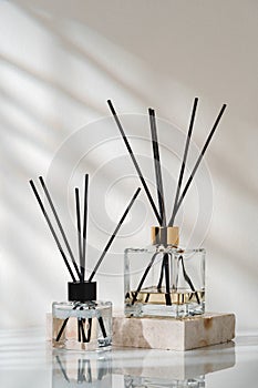 Elegant Aroma Diffusers on Marble Base in a Serene Indoor Setting photo