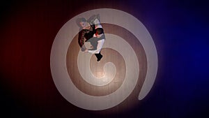 Elegant Ballroom Dance Couple on Spotlight. Top view