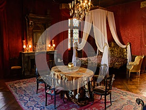 Elegant bedroom of a lady in a French castle photo