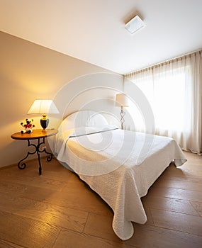 Elegant bedroom in modern villa