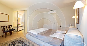 Elegant bedroom in modern villa