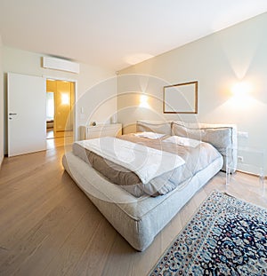 Elegant bedroom in modern villa
