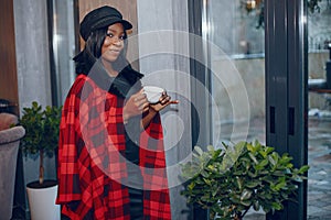 Elegant black girl in a cafe