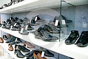 Elegant black leather man type of shoes selected and placed in order according to the latest fashion trends