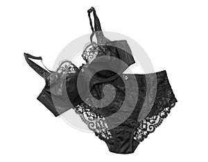 Elegant black plus size women`s underwear on background, top view