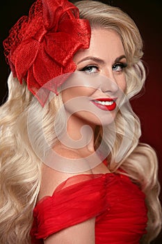 Elegant blonde woman portrait with retro red hat. Pretty girl wi