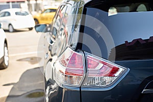 Elegant blue car headlight outdoors