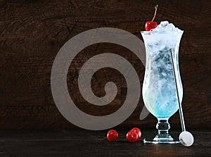 Elegant blue curacao cocktail with ice photo