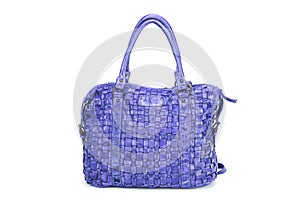 Elegant blue handbag sewn from intertwined leather strips isolated on white background