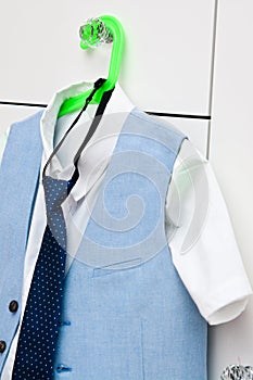 Elegant blue suit and shirt for a boy