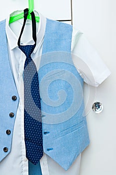 Elegant blue suit and shirt for a boy