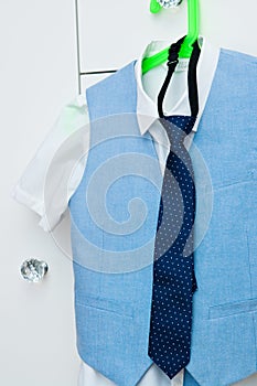 Elegant blue suit and shirt for a boy