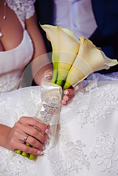 Elegant bridal bouquet of white callas.