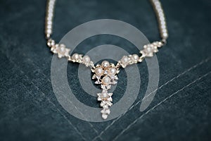 Elegant bridal necklace on dark background