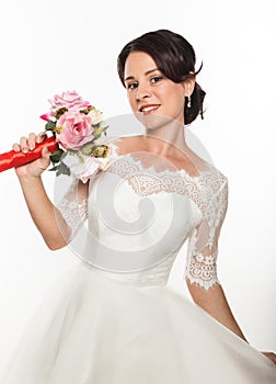 Elegant bride with beautiful wedding bouquet in a hands. wedding make-up and hairstyle concept