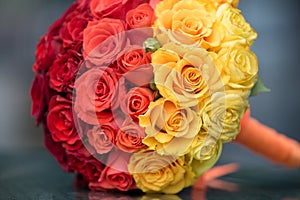 Elegant bride flowers with red, yellow and orange