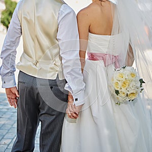 Elegant bride and groom posing together