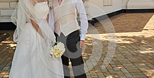 Elegant bride and groom posing together