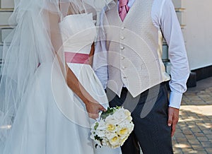 Elegant bride and groom posing together