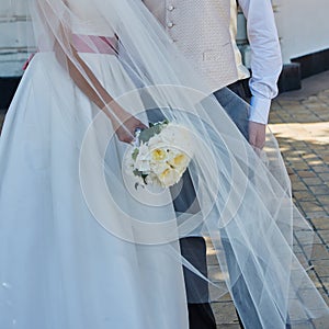 Elegant bride and groom posing together