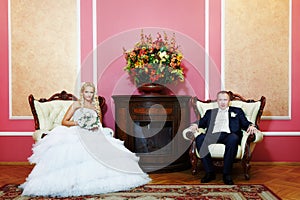 Elegant bride and groom in wedding palace