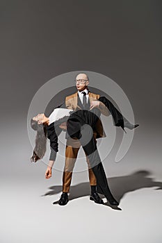 Elegant business couple in dramatic dance