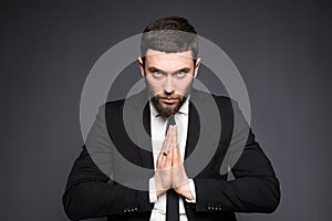 Elegant business man with pray gesture