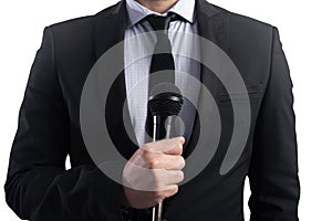 Elegant Businessman ready to speak with microphone