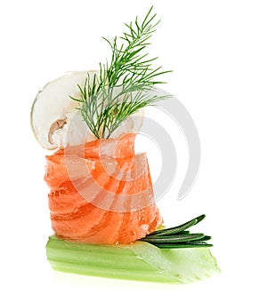 Elegant canape with salmon roll, celery, dill twig