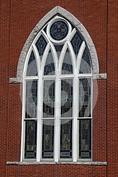 Elegant catherdral window with beautiful stained glass.