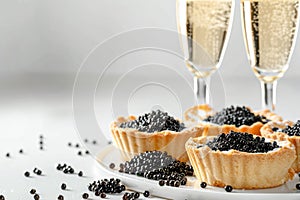 Elegant Champagne Toast with Luxury Caviar Tartlets Celebration