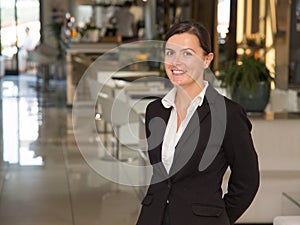 Elegant and cheerful woman receptionist