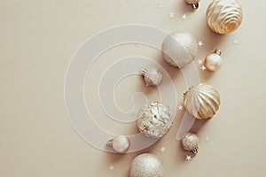 Elegant Christmas background with decorative balls and confetti on beige. Xmas banner design, New Year greeting card mockup. Flat