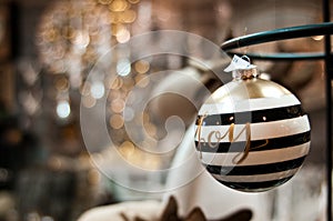 Elegant Christmas bauble with Joy word and bokeh