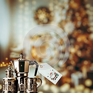 The elegant Christmas coffee set with price tag is on the bokeh Christmas scene