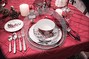 Elegant Christmas Placesetting with red tablecloth and Plaid napkins