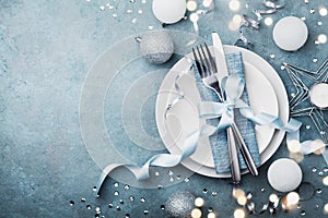 Elegant christmas table setting for holiday dinner top view. Empty space for text. Bokeh effect. photo