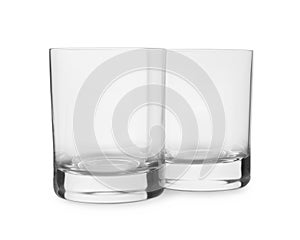 Elegant clean empty shot glasses isolated on white