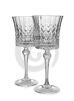 Elegant clean empty wine goblets on white