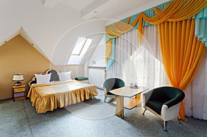 Elegant and comfortable interior of a bedroom in hotel