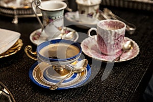 Elegant cooffe cup on a dark wooden table. photo