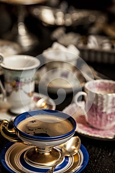 Elegant cooffe cup on a dark wooden table. photo
