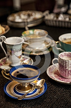 Elegant cooffe cup on a dark wooden table. photo