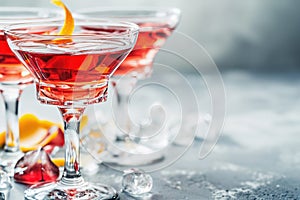 Elegant Cosmopolitan Cocktails Served with Orange Twist and Ice